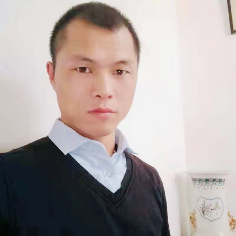 谭刚毅生前生活照。 受访者 供图