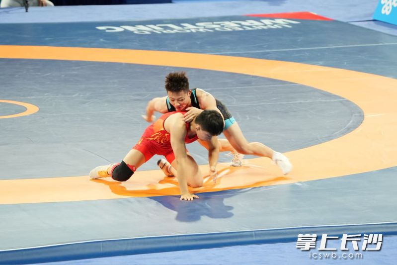 庞倩玉(上)在比赛中。 庞倩玉(上)在比赛中。