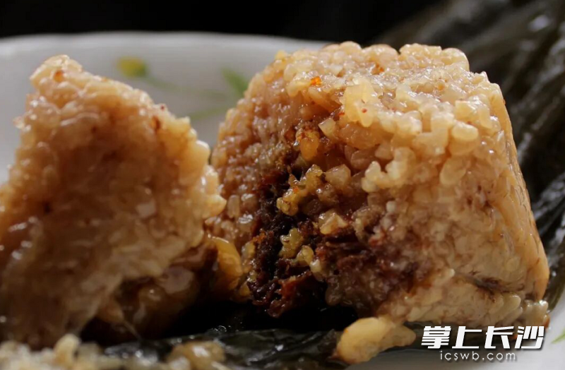 医生提醒，粽子好吃但不能过量。