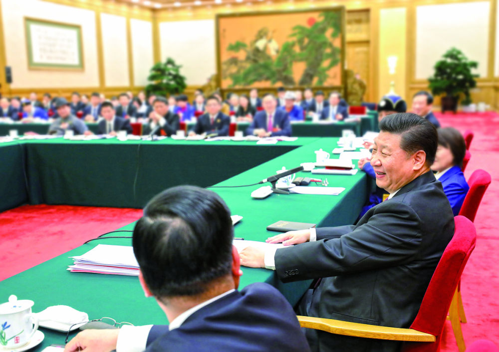 2018年3月5日，中共中央总书记、国家主席、中央军委主席习近平参加十三届全国人大一次会议内蒙古代表团的审议。新华社记者鞠鹏摄