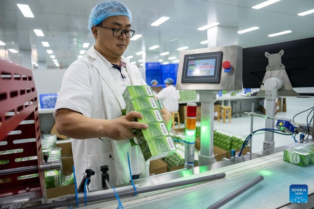 A man works at Hunan Warrant Chiral Pharmaceutical Co., Ltd, in Liuyang City, central China's Hunan Province, April 9, 2024.