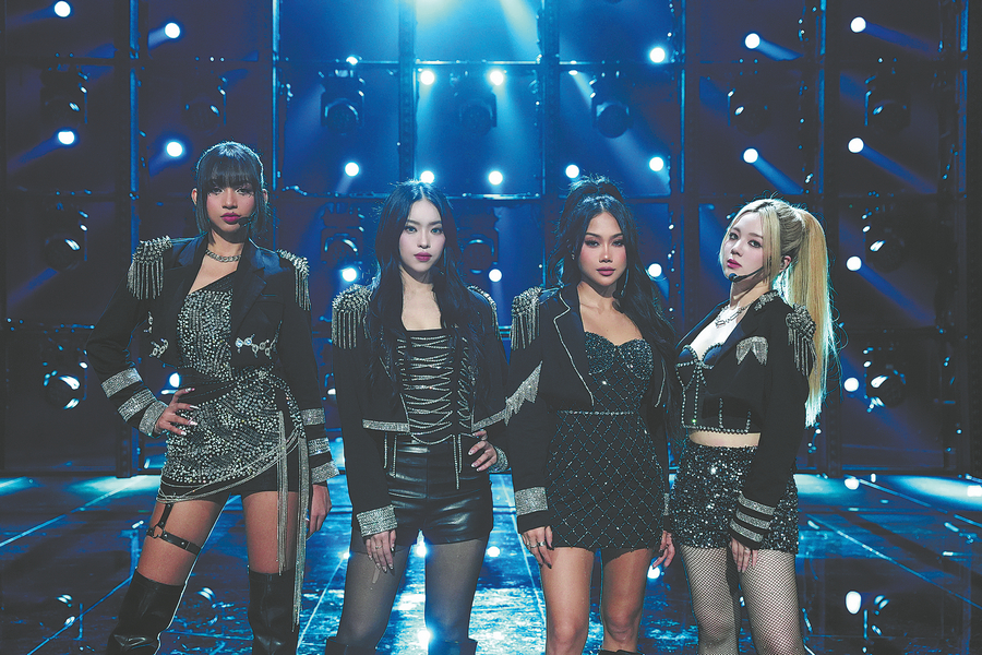 Members from the Malaysian girl group Dolla strut their stuff. CHINA DAILY