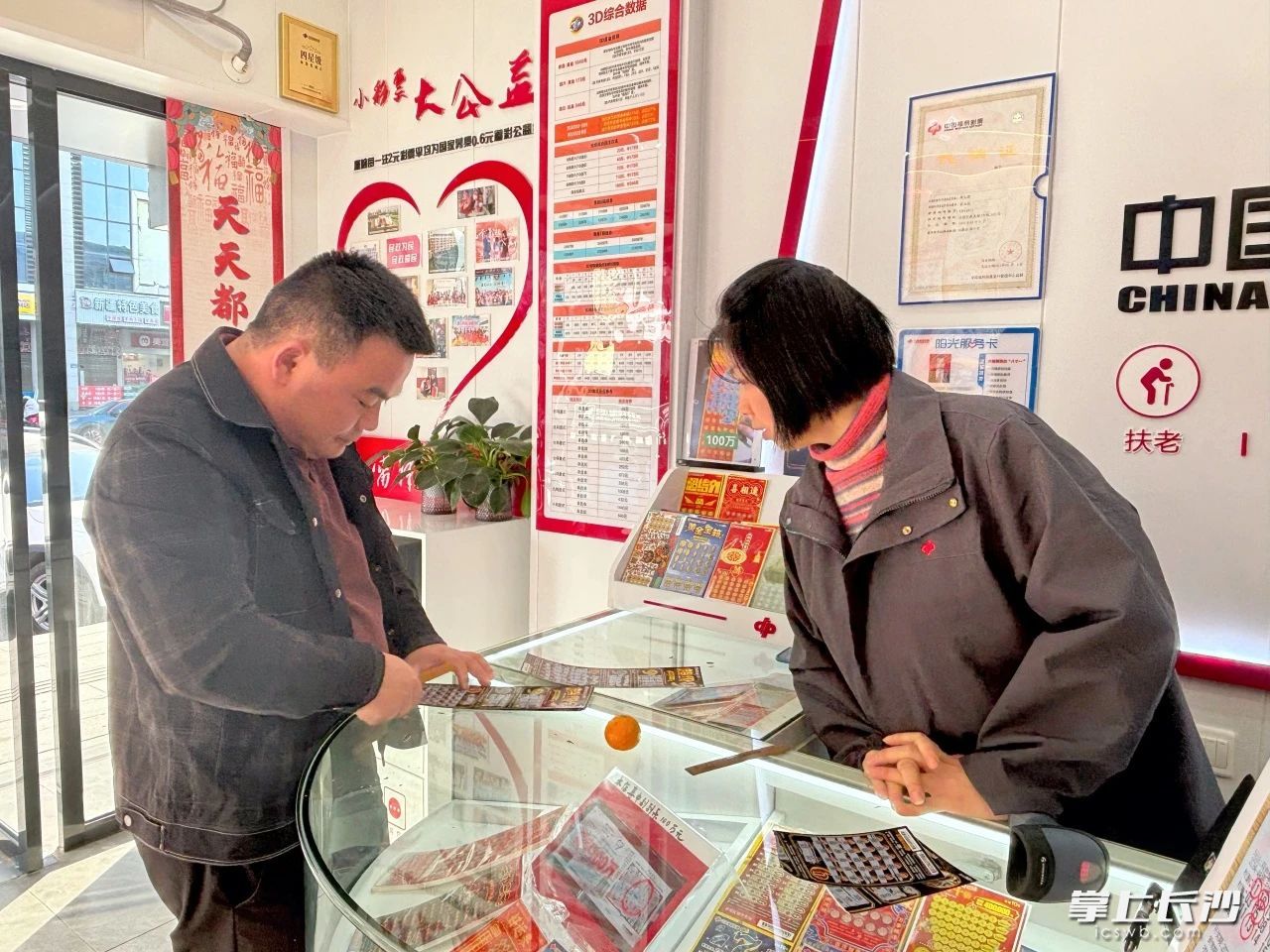 今年，是谭玉清从事福彩销售工作的第十二个年头。