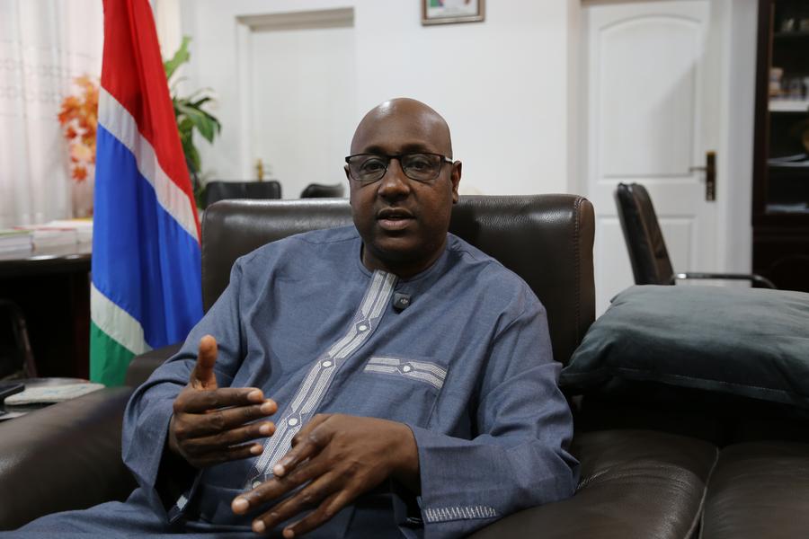 Gambian Minister of Agriculture Demba Sabally speaks during an exclusive interview with Xinhua in Banjul, Gambia, on March 12, 2025. (Xinhua/Si Yuan) 