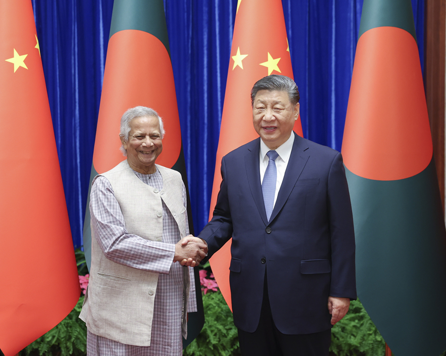 3月28日上午,国家主席习近平在北京人民大会堂会见孟加拉国临时政府首席顾问尤努斯。 3月28日上午,国家主席习近平在北京人民大会堂会见孟加拉国临时政府首席顾问尤努斯。